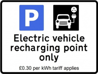 A range of electric vehicle charging point signs with tariff charge